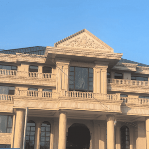 广安黄金麻别墅外墙干挂石材效果示例