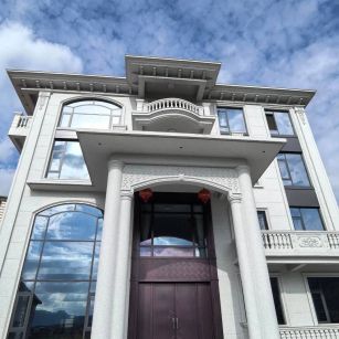 广安白麻别墅外墙干挂石材效果示例