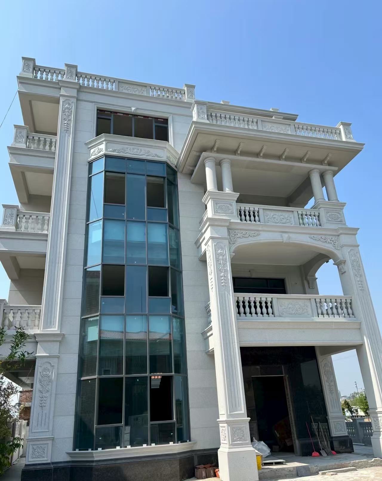 广安 白麻花岗岩别墅外墙干挂效果展示