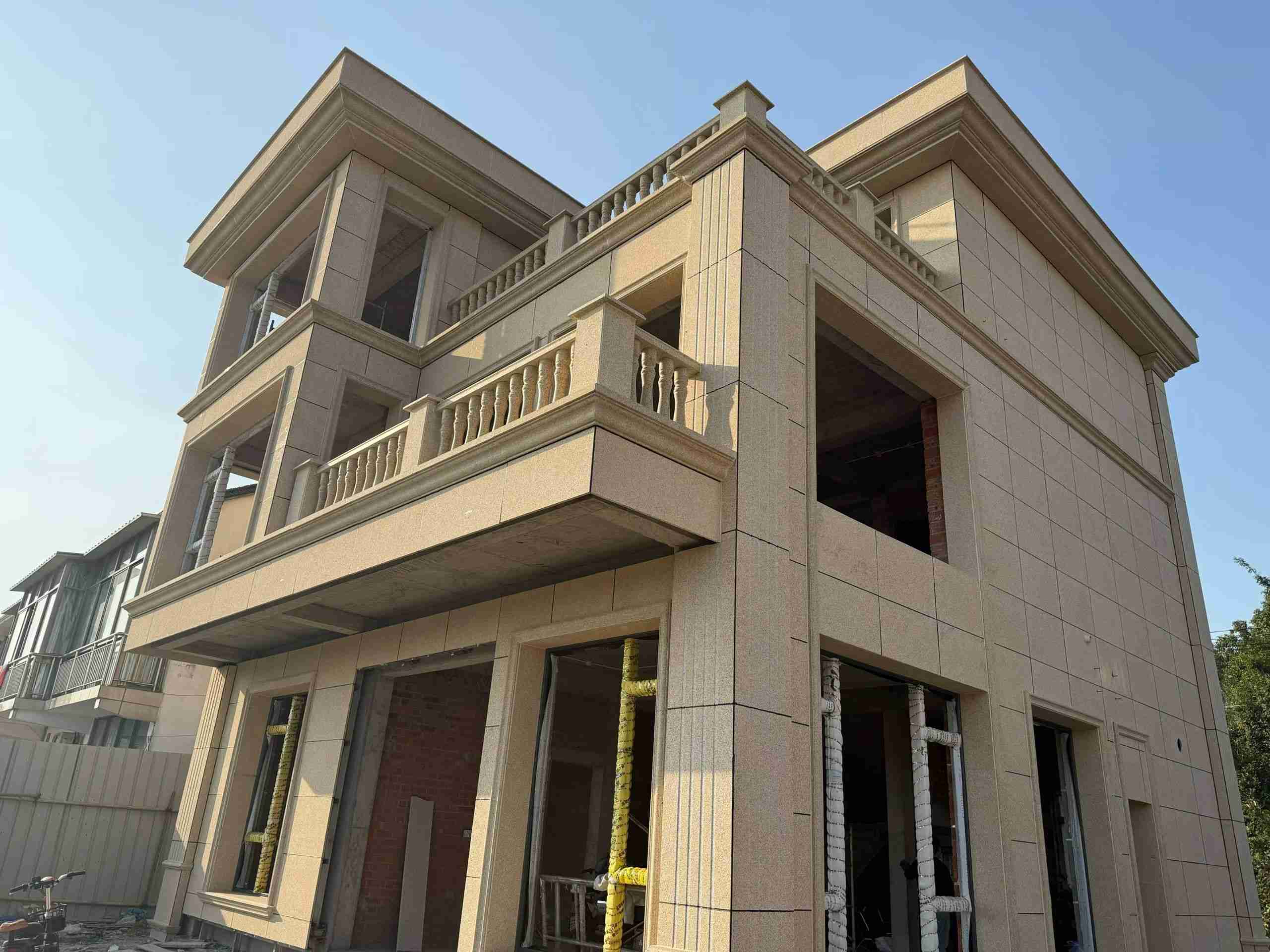 广安 黄金麻花岗岩石材荔枝面外墙干挂效果展示